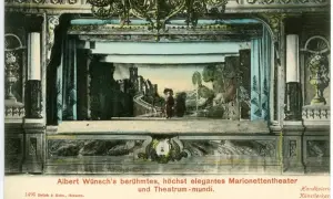 Scena teatru lalek Alberta Wünscha, eleganckie theatrum mundi z zamkiem i postacią.