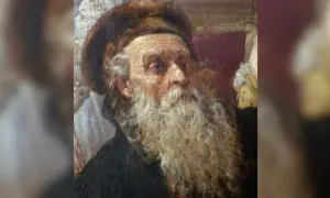 Portret starszego mężczyzny z długą, siwą brodą i futrzaną czapką.
