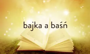 Otwarta księga, z której emanuje blask, symbolizuje cechy baśni. Słowa "bajka a baśń" unoszą się w magicznej poświacie.