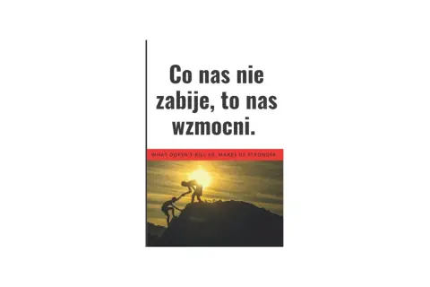 Dwie sylwetki wspinają się na szczyt góry przy zachodzie słońca. Napis głosi: "Co nas nie zabije, to nas wzmocni".