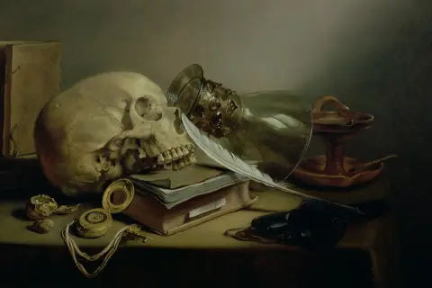 Czaszka, pióro, księga i zegarek – klasyczne symbole vanitas, przypominające o przemijaniu.