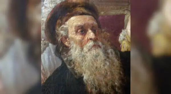 Portret starszego mężczyzny z długą, siwą brodą i futrzaną czapką.