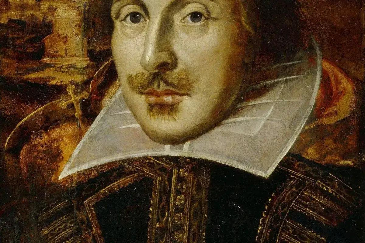 Portret Williama Szekspira, autora Romea i Julii, w bogatym stroju z epoki.