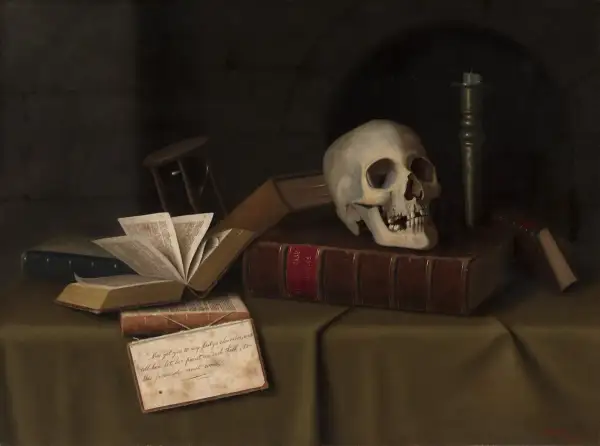 Czaszka na książkach, świeca i listek z cytatem z Szekspira przypominają o przemijaniu. Memento mori.